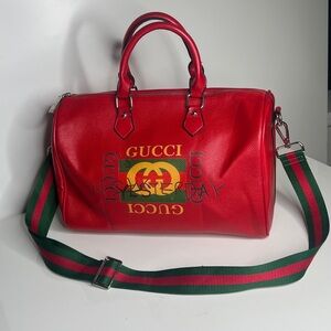 Red Pebbled Leather Large Zip Top Double Handle Duffle Bag w/ Crossbody Strap